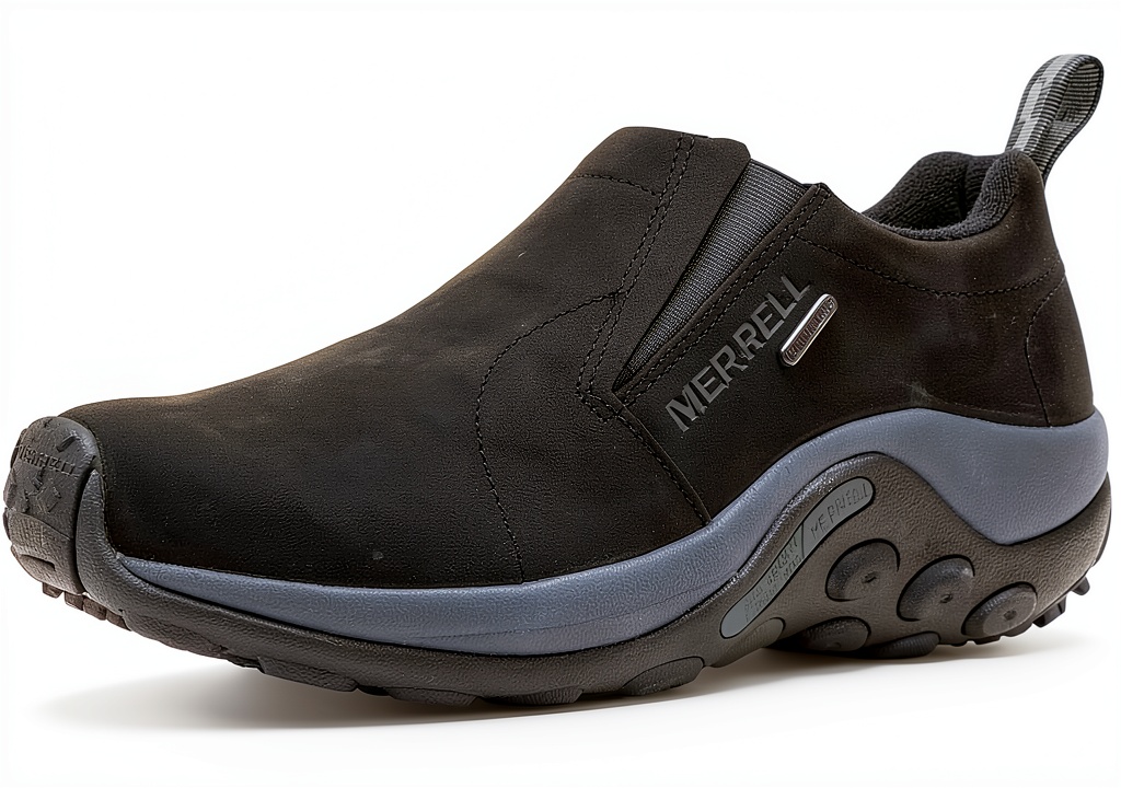 Installing Merrell Mens Waterproof Leather Slip On Loafers Black Brown on a wooden desk